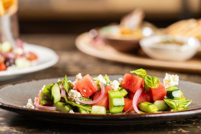 The most summery Summer dish there ever was. Watermelon Salad with watermelon, feta cheese, basil, mint, pistachios, arugula, and lime vinaigrette. So good! 😋 #summer #salad #eatlocal
